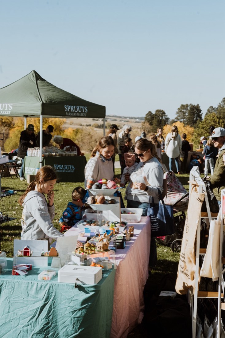 Vendor tents and shoppers at the Fall Fest Marketplace